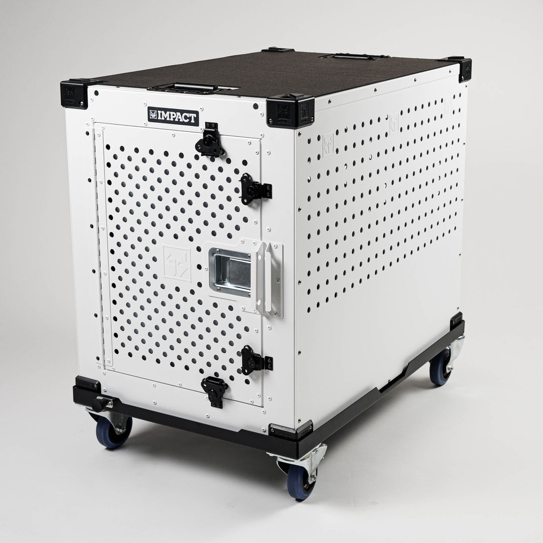 white high anxiety dog crate sitting on the wheel cart