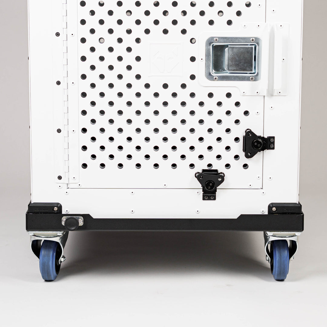 white high anxiety dog crate sitting on the wheel cart
