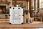 A Mastiff sitting beside Impact's white Collapsible Dog Crate in a cozy living room.